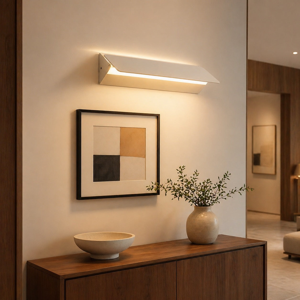 Adjustable wall-mounted LED reading light beside a bed
