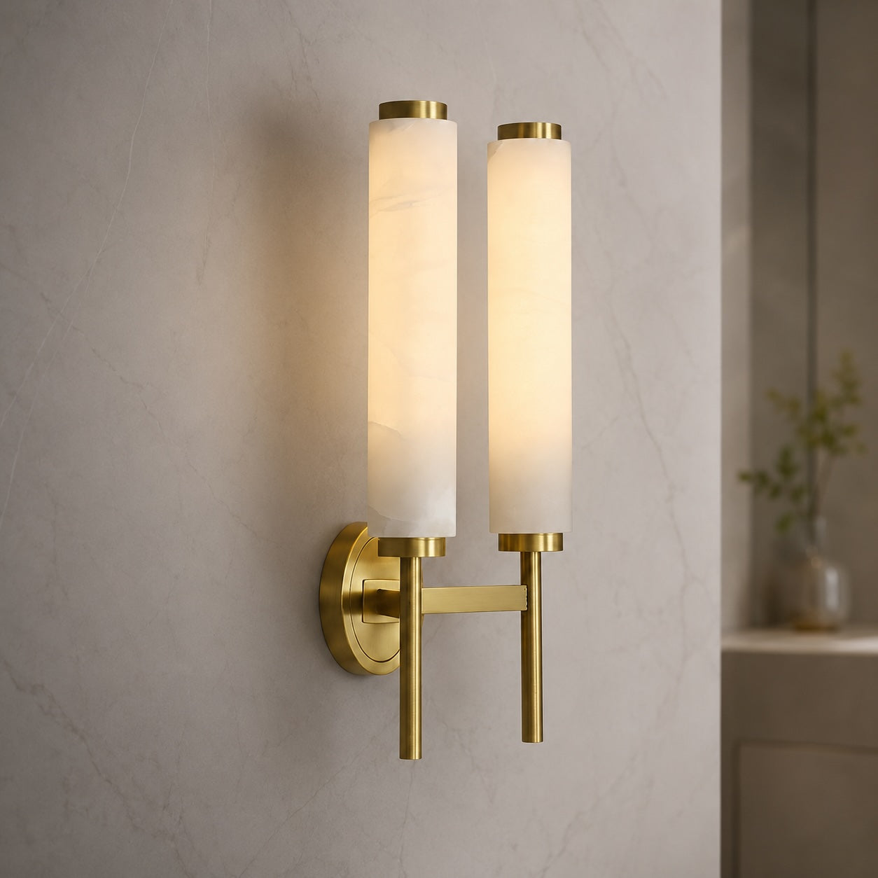 Modern wall sconce with an adjustable alabaster shade and metal fixture