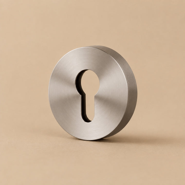 Modern Brass Door Handle Set with Knurled Grip and Circular Base for Internal Doors