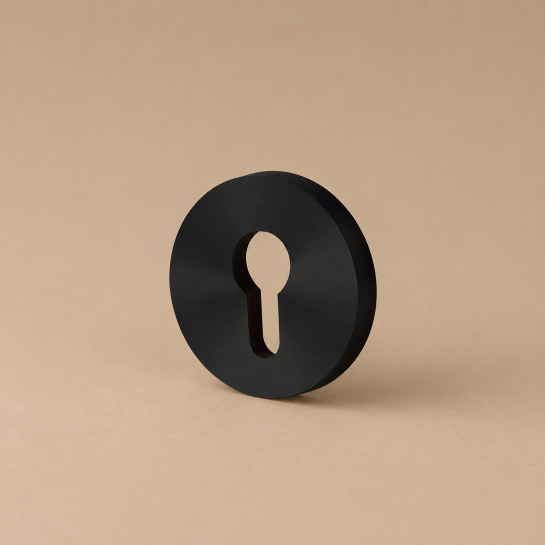 Modern Brass Door Handle Set with Knurled Grip and Circular Base for Internal Doors