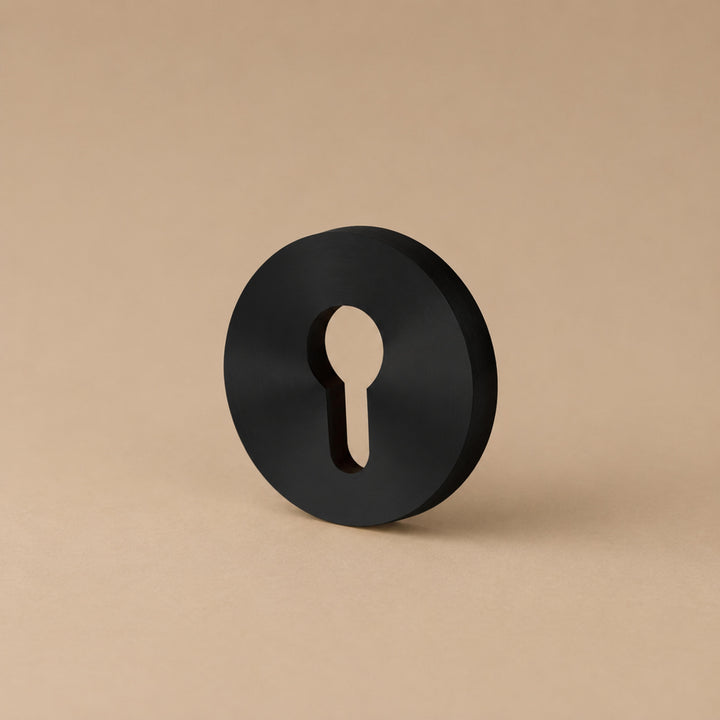 Modern Brass Door Handle Set with Knurled Grip and Circular Base for Internal Doors