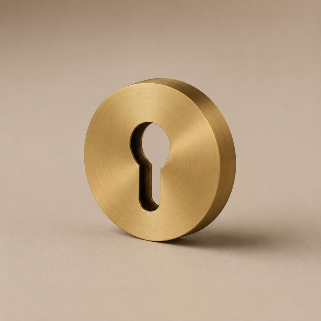 Modern Brass Door Handle Set with Knurled Grip and Circular Base for Internal Doors