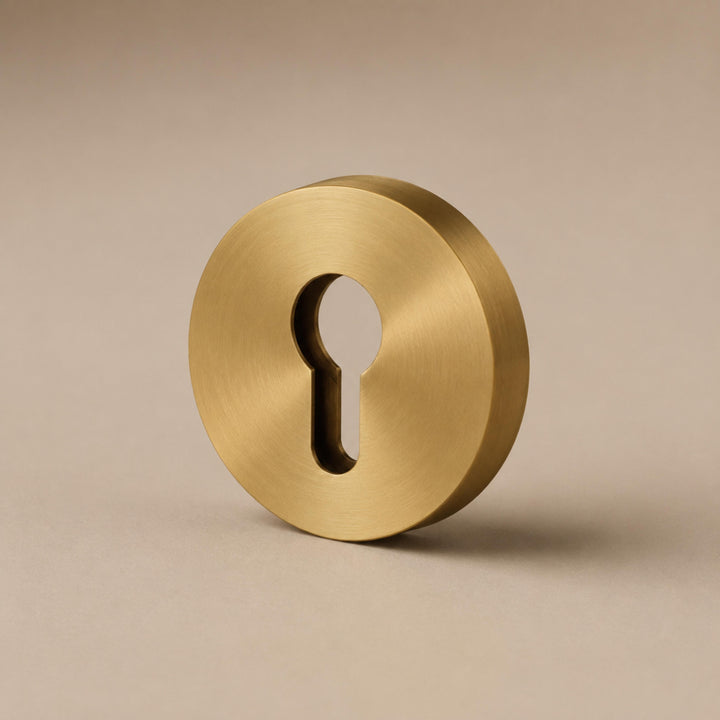Modern Brass Door Handle Set with Knurled Grip and Circular Base for Internal Doors