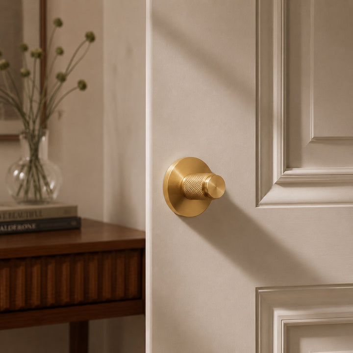 Modern Brass Door Handle Set with Knurled Grip and Circular Base for Internal Doors