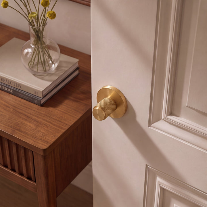 Modern Brass Door Handle Set with Knurled Grip and Circular Base for Internal Doors