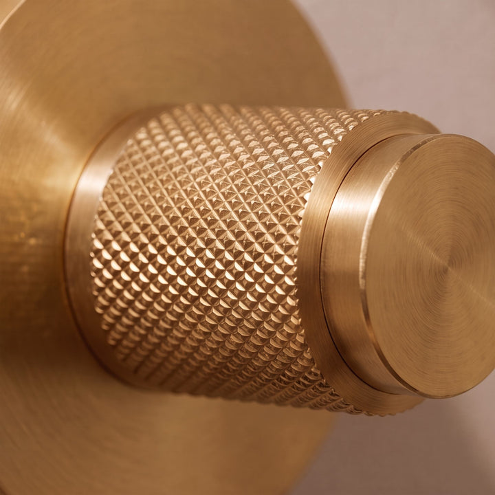 Modern Brass Door Handle Set with Knurled Grip and Circular Base for Internal Doors
