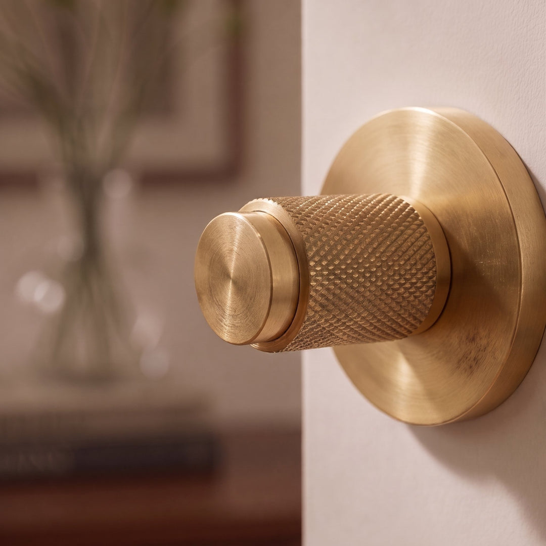 Modern Brass Door Handle Set with Knurled Grip and Circular Base for Internal Doors