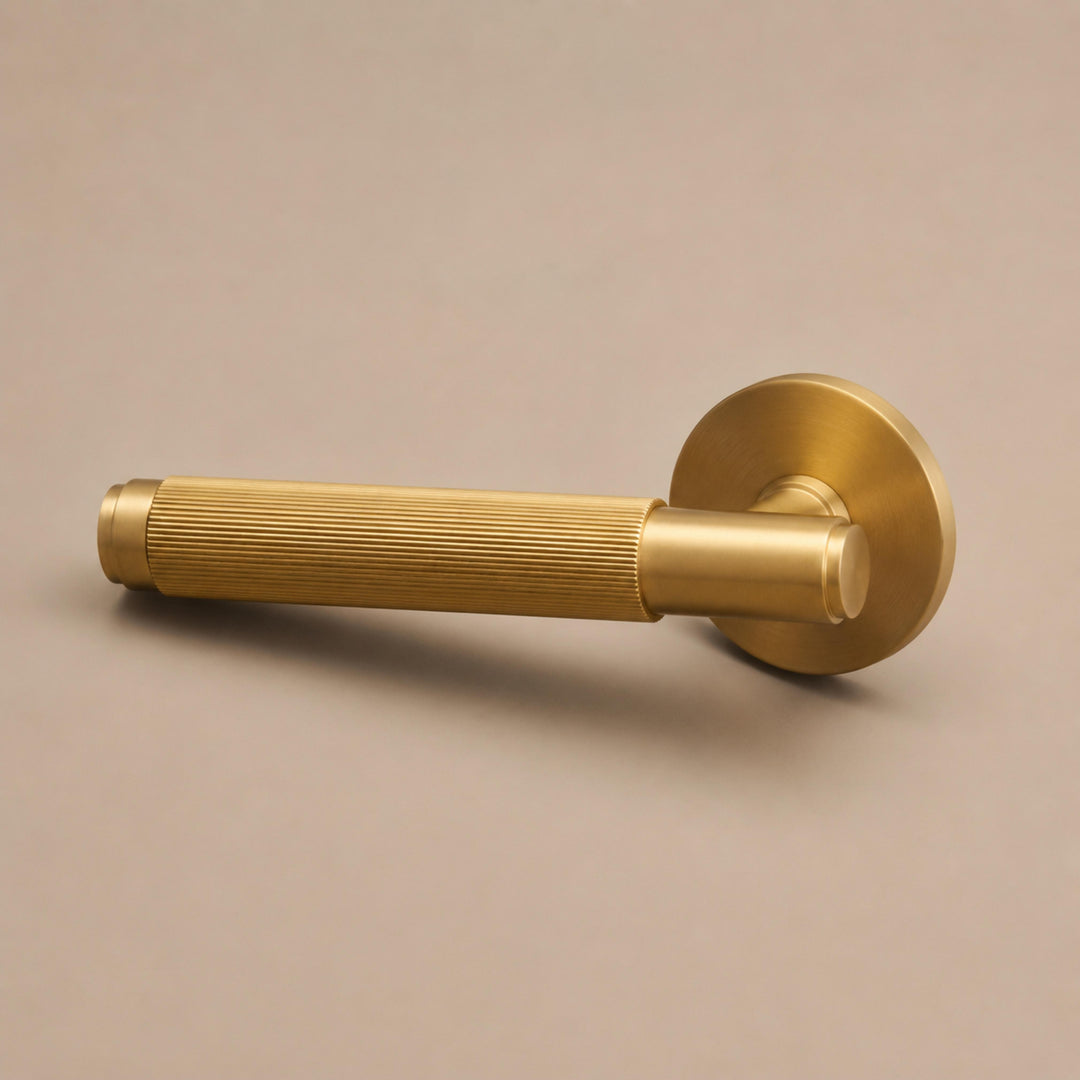 Modern Brass Door Handle Set with Knurled Grip and Emergency Access Lock for Internal Doors