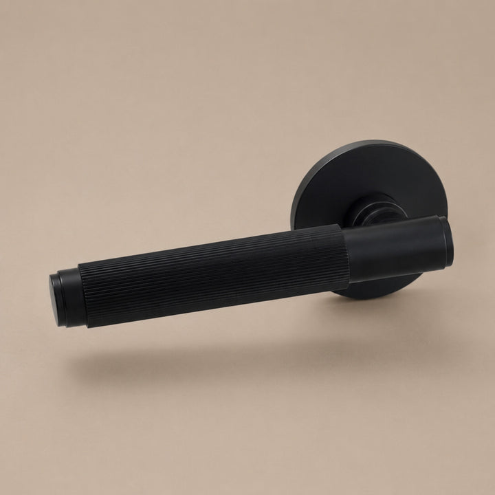 Modern Brass Door Handle Set with Knurled Grip and Emergency Access Lock for Internal Doors