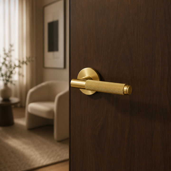 Modern Brass Door Handle Set with Knurled Grip and Emergency Access Lock for Internal Doors