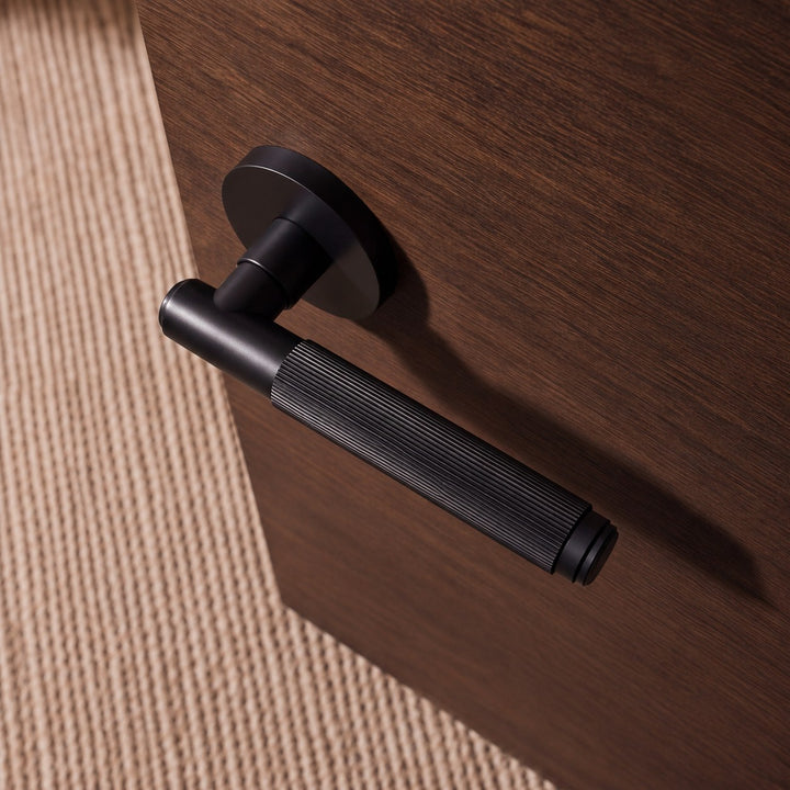 Modern Brass Door Handle Set with Knurled Grip and Emergency Access Lock for Internal Doors