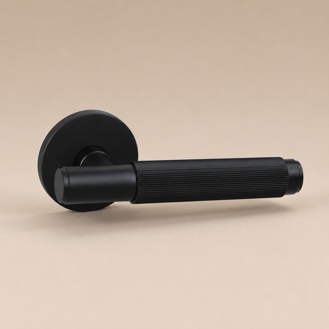 Modern Brass Door Handle Set with Knurled Grip and Emergency Access Lock for Internal Doors