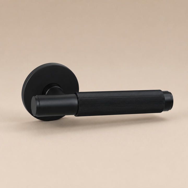 Modern Brass Door Handle Set with Knurled Grip and Emergency Access Lock for Internal Doors