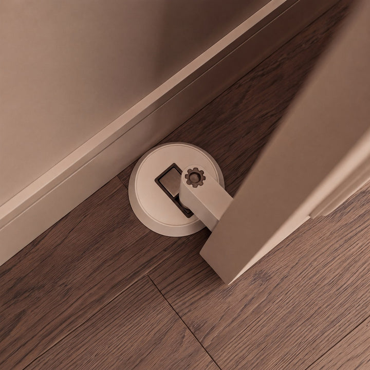 Modern Brass Door Stop with Cylindrical Design and Soft-Touch Mechanism for Floor Protection