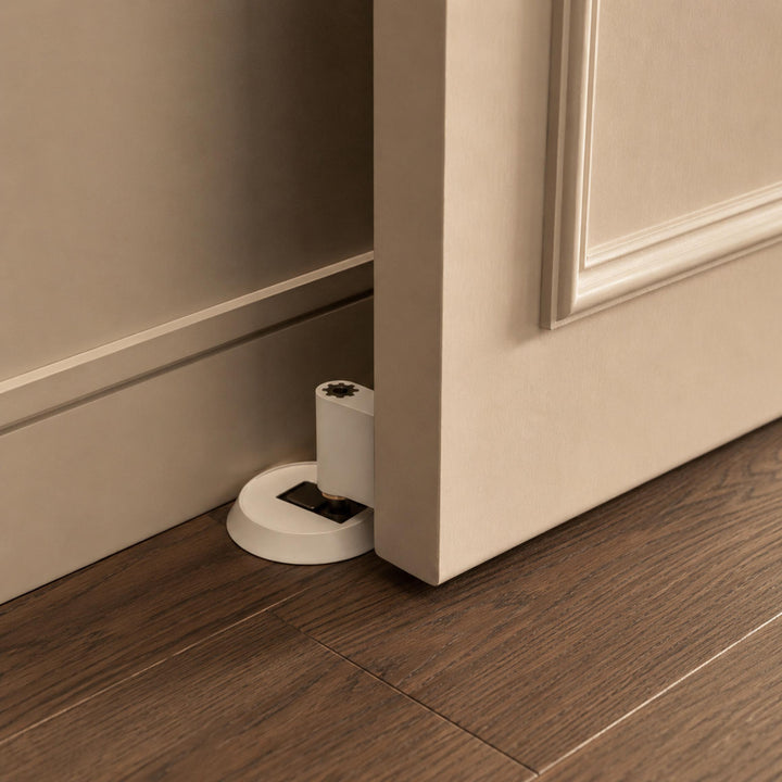Modern Brass Door Stop with Cylindrical Design and Soft-Touch Mechanism for Floor Protection
