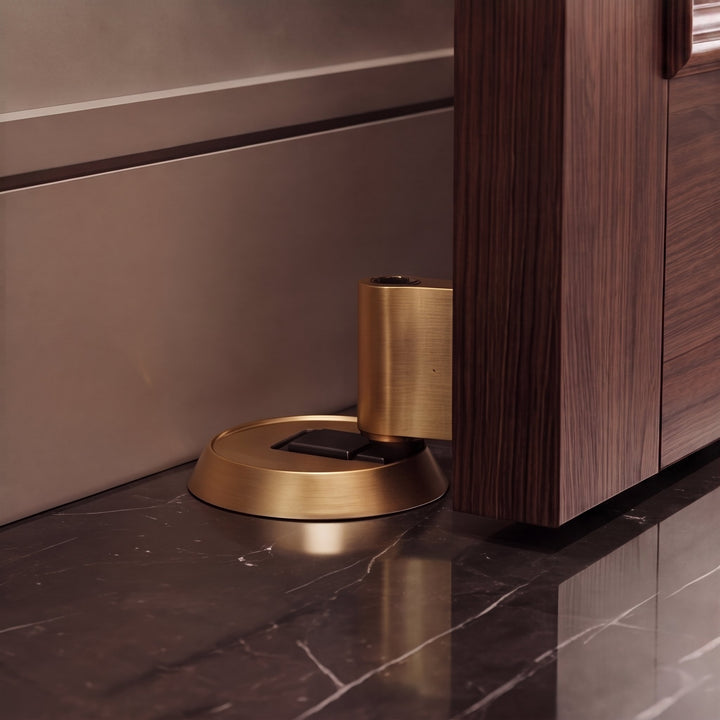 Modern Brass Door Stop with Cylindrical Design and Soft-Touch Mechanism for Floor Protection