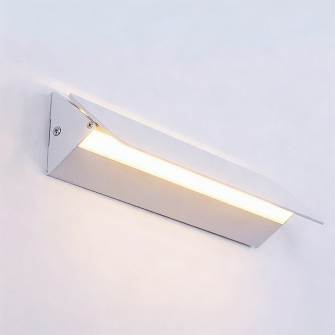 White wedge-shaped LED wall sconce with angled warm strip light, minimalist picture or bathroom wall light Australia