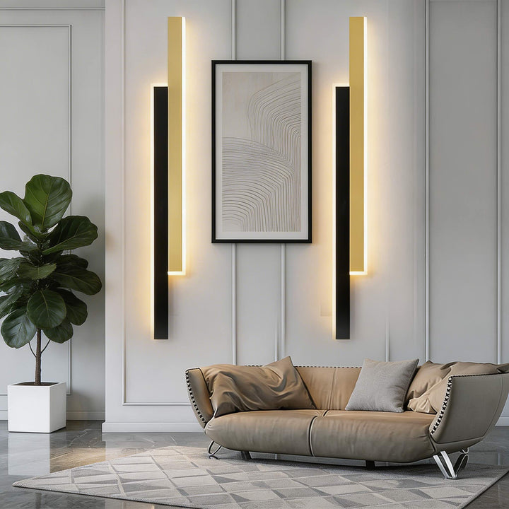 Wall sconces in modern black and gold finish with slim linear LED design, minimalist vertical wall lights with warm glow and luxe appeal for interiors