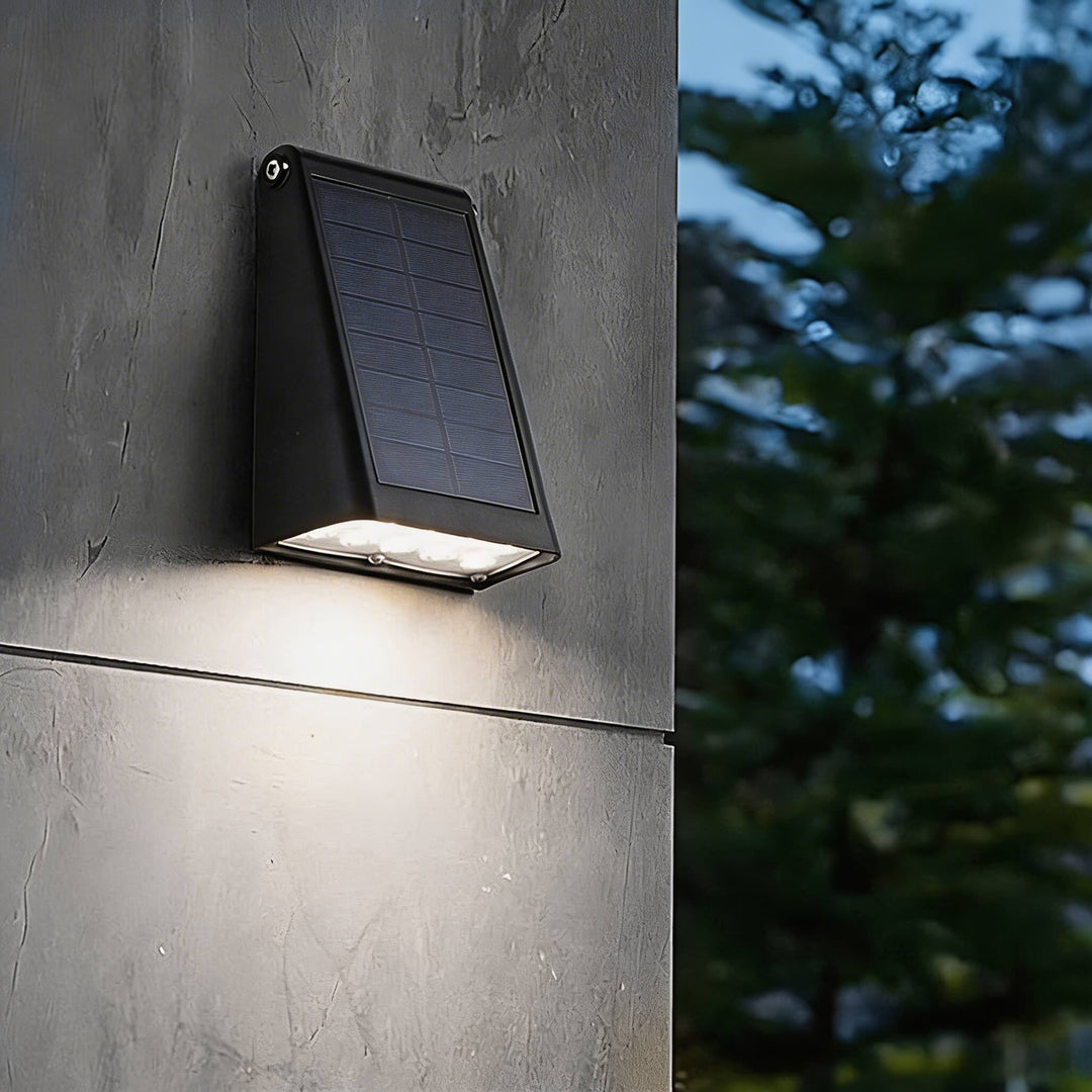 Wall sconces black solar powered LED wall light with slim tapered silhouette, integrated solar panel and bright downward glow for modern exteriors use