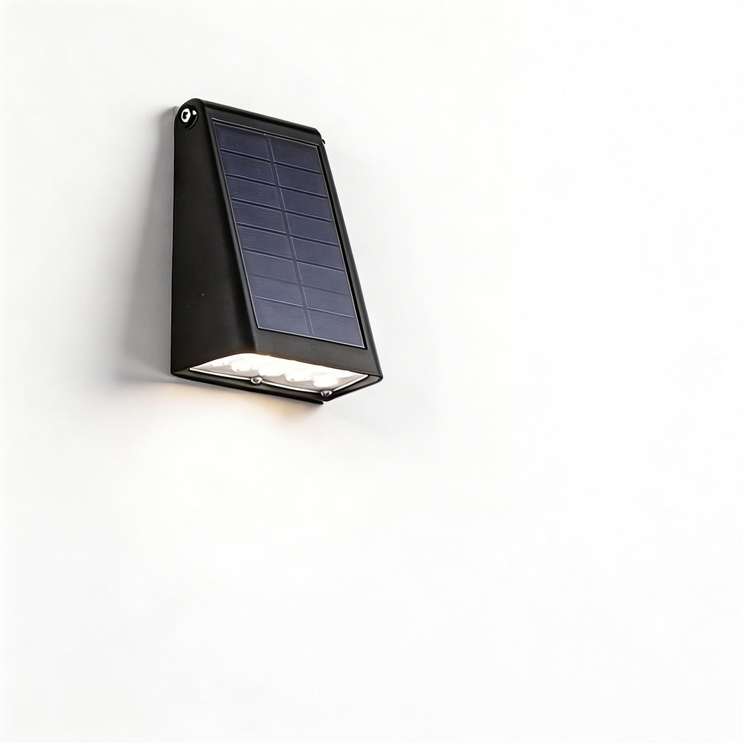 Wall lights black solar LED sconce featuring a compact angled form, top mounted solar panel and clean downward illumination for outdoor walls area