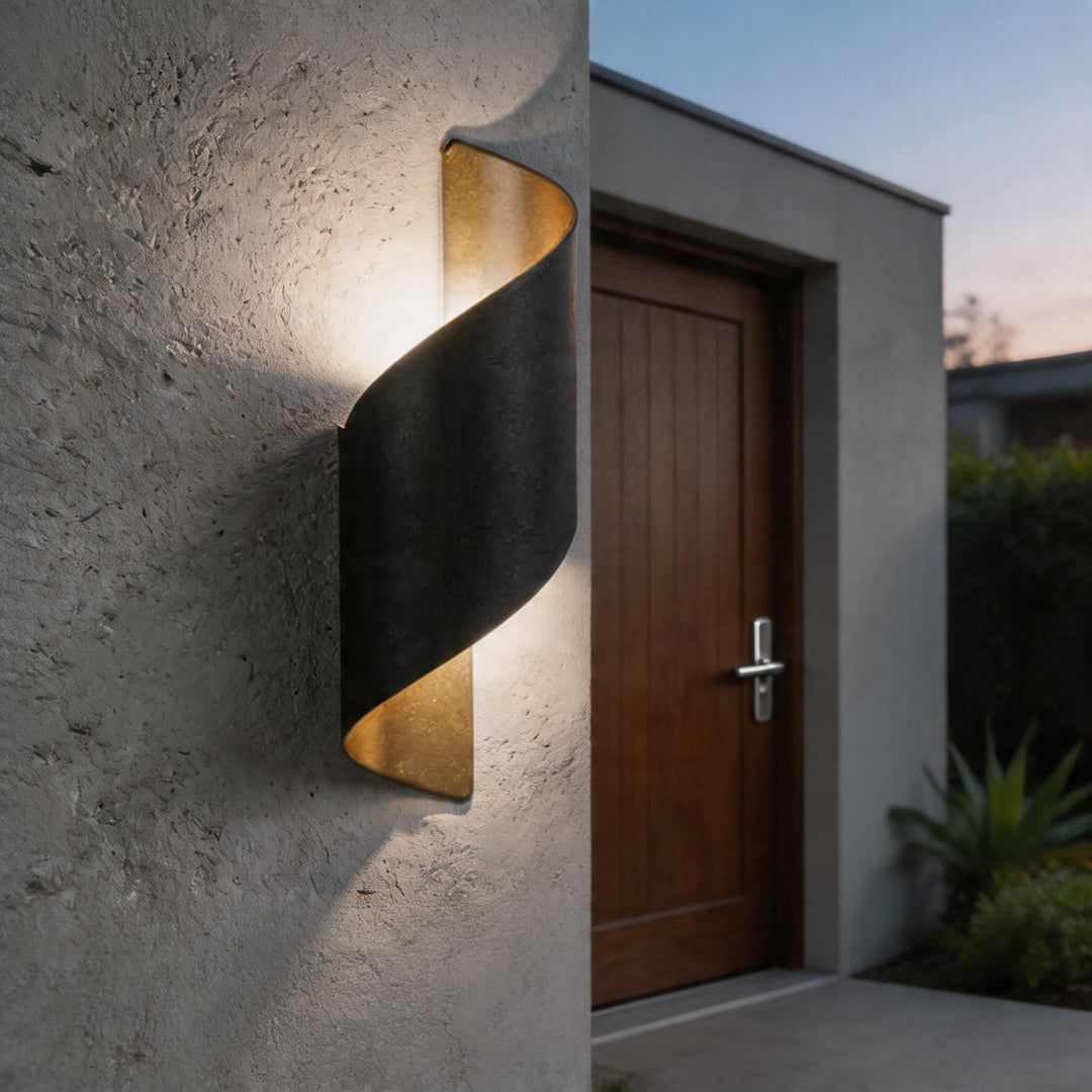 Wall sconce in black twisted design, modern outdoor wall light with warm up and down illumination and sculptural curved silhouette