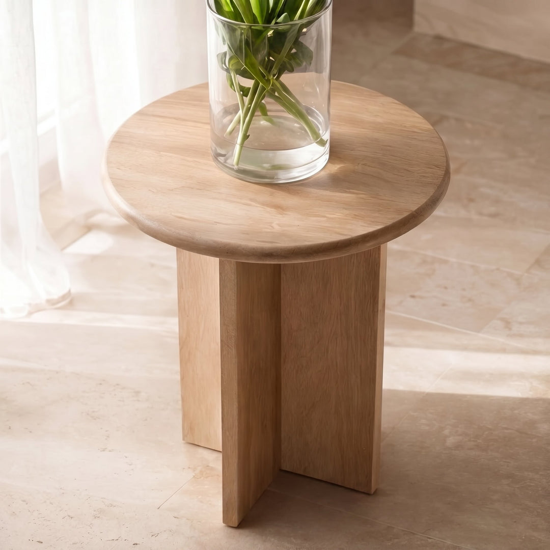 Minimalist Round Side Table in Natural Travertine with Intersecting Base for Compact Spaces